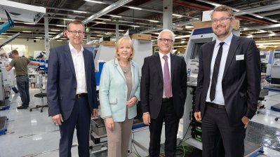 Gruppenfoto mit Ministerpräsidentin Kraft und der Geschäftsleitung