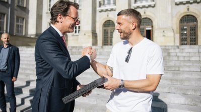 MP Wüst trifft Lukas Podolski