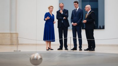 Wissenschaftsministerin Brandes mit Bundeskanzler Merz, Ministerpräsident Hendrik Wüst und dem Oberbürgermeister Markus Lewe 