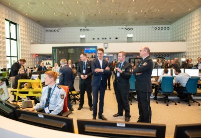 Ministerpräsident Wüst und Innenminister Reul besuchen das International Police Cooperation Center