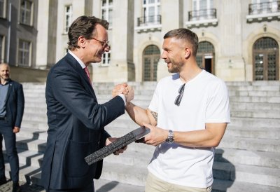 MP Wüst trifft Lukas Podolski