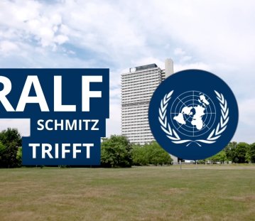 Titelbild "Ralf Schmitz trifft", daneben das UN-Logo