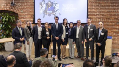 Ministerpräsident hält Rede zu Künstlicher Intelligenz vor Branchenspezialisten bei AI-Symposium