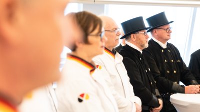 Neujahrswünsche der Schornsteinfeger und Bäcker