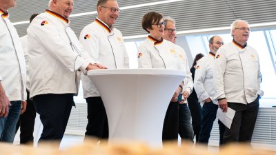 Neujahrswünsche der Schornsteinfeger und Bäcker