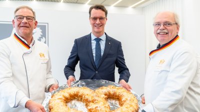 Neujahrswünsche der Schornsteinfeger und Bäcker