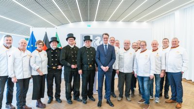 Neujahrswünsche der Schornsteinfeger und Bäcker