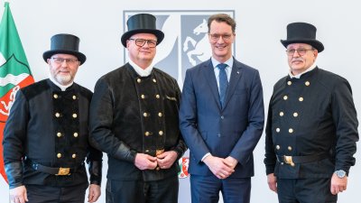 Neujahrswünsche der Schornsteinfeger und Bäcker