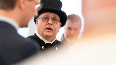 Neujahrswünsche der Schornsteinfeger und Bäcker