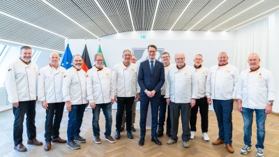 Neujahrswünsche der Schornsteinfeger und Bäcker