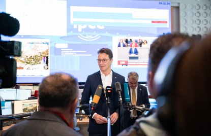 Ministerpräsident Wüst und Innenminister Reul besuchen das International Police Cooperation Center
